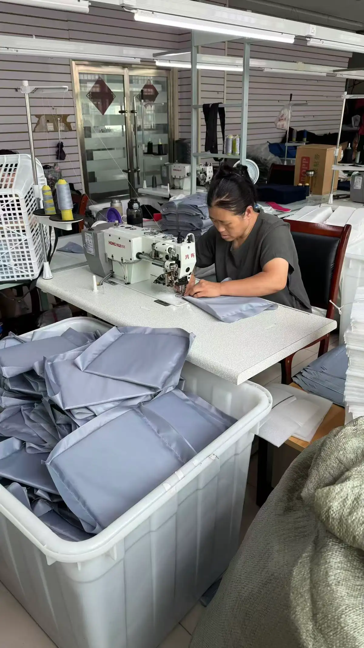 Operator sewing bag panels