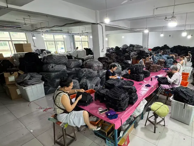QC inspectors checking backpacks