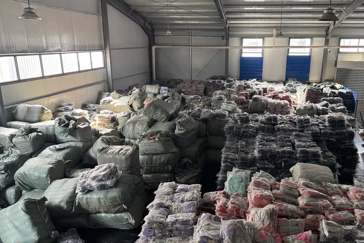 Stock backpacks sorted by colour family