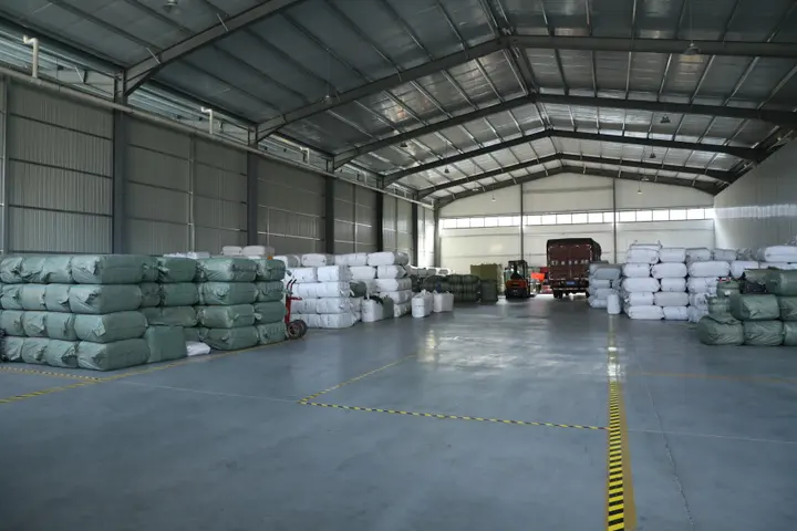 Wide view of the Senszx finished-goods backpack warehouse in Baigou