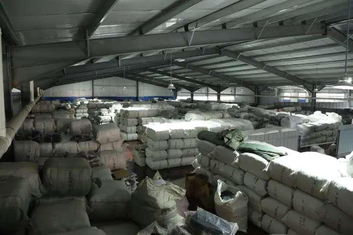 Loading area of the Senszx factory with pallets staged for a container