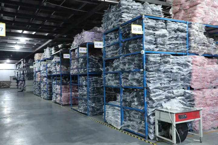 Racked ready-to-ship stock backpacks in the Senszx warehouse